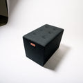 Dark grey rectangular storage bench with tufted lid, suitable for living room furniture by PedestalDiningCo.