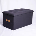 Dark grey rectangular storage bench with tufted lid, ideal for living room furniture by PedestalDiningCo.