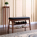 Dark wood shoe bench with black leather cushion, padded porte-shoe storage for entryway, by PedestalDiningCo.